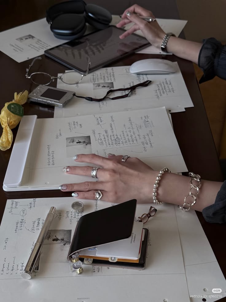 A planner and laptop laid out for mapping application deadlines