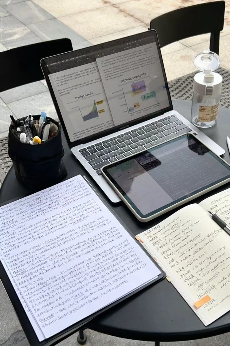 A person reviewing job listings and notes at a desk