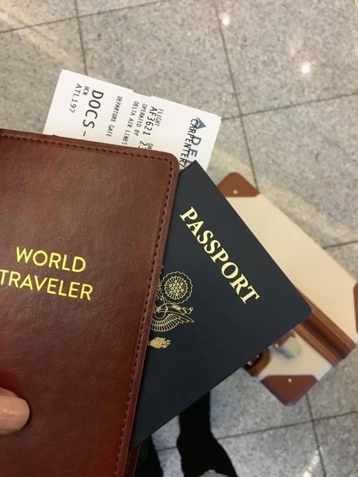 A passport with a visa page open on a desk