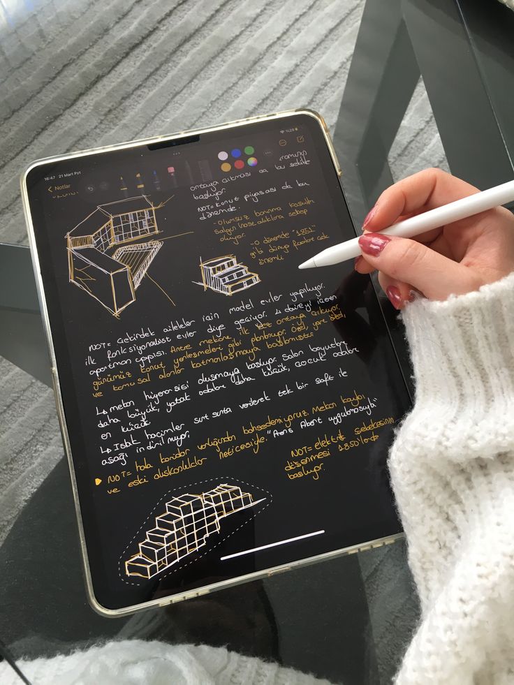 An open notebook and pen on a study desk ready for writing