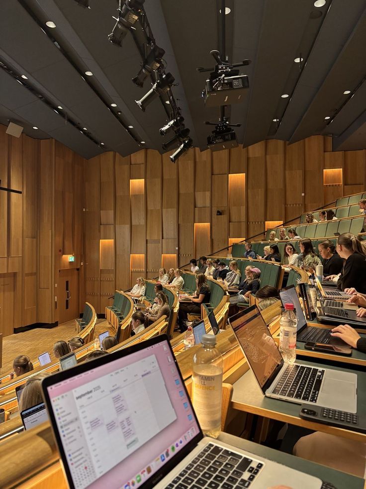 International students studying together at a table in a university library